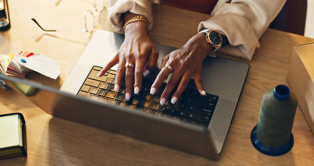 Image showing Top view, business and woman with a laptop, fashion and typing with connection, ecommerce and online order. Closeup, hands and entrepreneur with a pc, company website and supply chain with employee