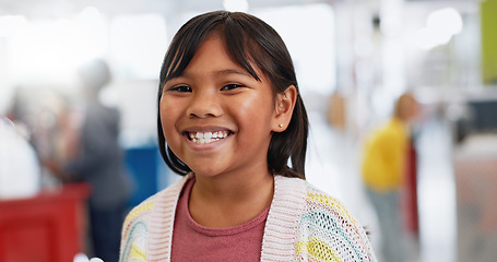 Image showing Portrait, girl and child with learning for knowledge, education and future with smile and confidence. Face, student and kid with happiness in classroom, school or academy for development and study