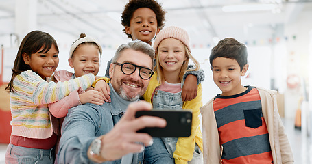Image showing Selfie, children and teacher with smartphone, happy and smile for picture, excited and teacher. Kids, internet and cellphone for technology, online and memories for school, classroom and diversity