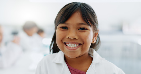 Image showing Portrait, girl and child in laboratory for chemistry, knowledge or learning about science with smile and lab coat. Face, student and kid with happiness in classroom, workshop or academy for education