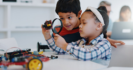 Image showing Children, magnifying glass and classroom for robotics, education and learning for technology, science and school. Childhood, students or innovation with kids, studying or inspection project research