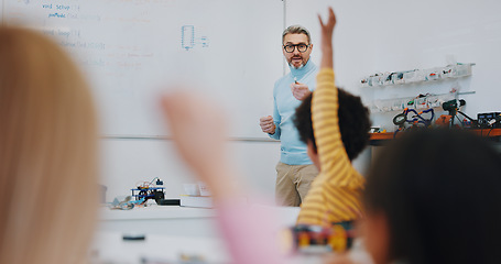 Image showing Science, raised hand and teacher with child in classroom for research on a project in school. Knowledge, education and man educator or tutor helping kid student on digital technology for chemistry.