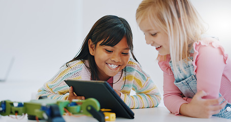 Image showing Learning, children and tablet in robotics classroom for engineering, science and technology education. School, teamwork and girls online together with elearning game, problem solving or research