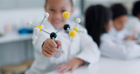 Image showing Child, molecular structure and education, learning science or knowledge in classroom or school laboratory. Student kid portrait with atom or molecule model for scientist, project and happy physics