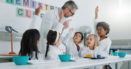 Image showing Science, question and students in class with their teacher for learning or to study chemistry. Children, hands raised and education with kids in a laboratory for an experiment of chemical reaction