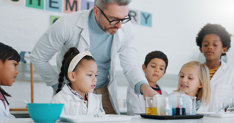 Image showing Chemistry, teacher and students with education, classroom and science with research, conversation and experiment. School, man and children with educator, laboratory or kids with support and questions