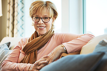 Image showing Portrait, mature or happy woman on couch to relax with calm on living room sofa at home. Apartment, glasses or senior lady with smile, peace or wellness in retirement, lounge or house for resting