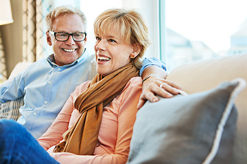 Image showing Relax, happy and mature couple on sofa for bonding, healthy relationship and marriage. Retirement, home and senior man and woman laughing on couch for love, commitment and happiness in living room