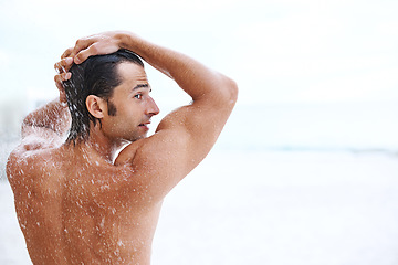 Image showing Shower, beach and man with water for washing, cleaning hair and grooming for healthy skin. Back mockup, treatment and person with splash for natural hygiene, wellness and skincare hydration