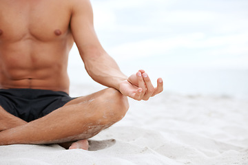 Image showing Man, lotus or hand on beach closeup for meditation, zen peace or spiritual practice. Male person, fingers or ocean sand or holistic balance for growth reflection, mind thinking chakra or calm healing
