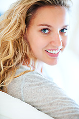 Image showing Portrait, smile and natural beauty of woman in home for dermatology or cosmetic. Face, happy blonde girl and skincare of person, aesthetic or facial glow, health or wellness to relax on sofa in house