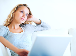 Image showing Thinking, laptop and woman on sofa for remote work, planning or dream. Computer, idea and freelance person in living room, decision making or strategy for project, problem solving or solution in home