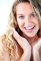 Image showing Portrait, hands and natural beauty of woman for dermatology or cosmetic. Face, happy blonde girl and skincare of person excited for aesthetic, facial glow or skin health, wellness and spa treatment