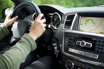 Image showing Hands, car interior and digital map on dashboard screen, travel and road trip with person driving and transportation. Navigation, automobile and technology with network, journey and adventure