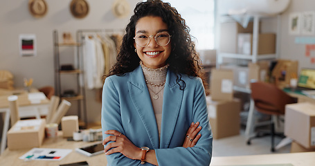 Image showing Portrait, business woman and fashion designer with arms crossed in clothes store or startup. Confidence, happy tailor and face of professional, entrepreneur and creative worker in glasses in Brazil