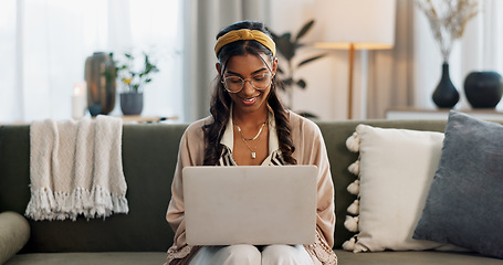 Image showing Laptop, remote work and happy woman on a sofa for social media, research or reading a home. Tech, freelance and female entrepreneur online in a living room with email, chat or upskill course search