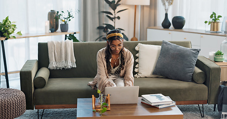 Image showing Woman, student and laptop on sofa for home education, e learning and scholarship research or college registration. Young person typing on her computer for studying, knowledge and online essay writing