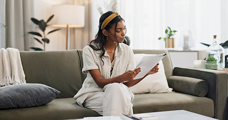 Image showing Woman reading documents in home for budget, planning finance and student loan information. Indian girl check banking report, paperwork and bills for investment, taxes and savings for insurance policy