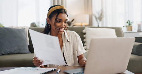 Image showing Woman, work from home and documents on laptop for online research, financial planning and data report. Young worker or freelancer typing on her computer with paperwork, bills and taxes in living room