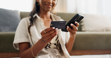 Image showing Happy woman, hands and phone with credit card for payment, online shopping or transaction in living room at home. Closeup of female person or shopper on mobile smartphone with debit for ecommerce