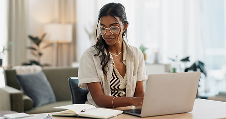 Image showing Woman, work from home and notebook or laptop for online research, creative planning and copywriting ideas. Young writer or freelancer typing on her computer with blog notes, vision and brainstorming