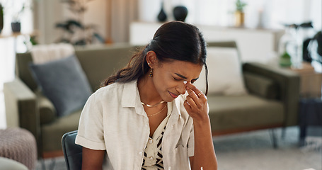 Image showing Woman, pain and headache in living room for stress, mental health or anxiety of fatigue, frustrated crisis or depression. Tired indian girl with eye strain from burnout, vertigo and brain fog at home