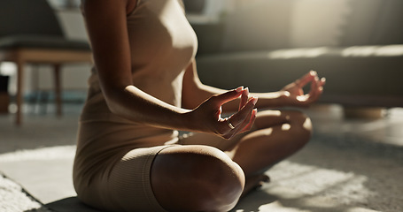 Image showing Woman, yoga and meditation hands on floor, house and peace for chakra balance, relax and healthy in living room. Girl, body and spiritual for pilates, closeup and wellness with zen mindfulness