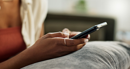 Image showing Hands, woman and typing on smartphone in home, reading social media notification and update digital subscription. Closeup, cellphone app and download mobile games, search online network and contact