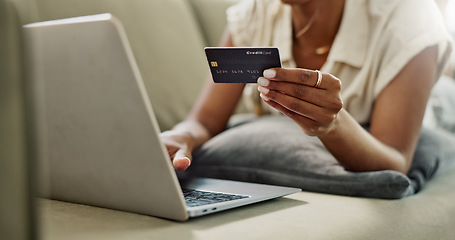 Image showing Credit Card, laptop and hands of woman online shopping for discount deal, financial purchase or ecommerce choice. Debit, easy payment and closeup customer typing banking password on home lounge couch