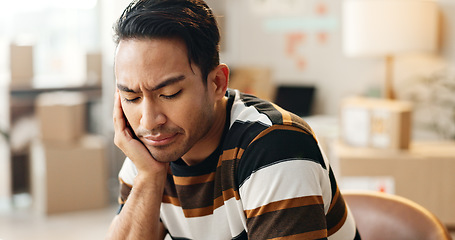 Image showing Man, stress and logistics by boxes, e commerce startup or thinking of shipping solution in workshop. Frustrated entrepreneur, small business owner or idea for problem solving with supply chain crisis