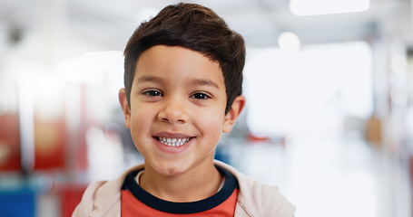 Image showing Portrait, boy and child with learning for knowledge, scholarship and education with smile at school. Face, student and kid with confidence or happy at academy or classroom for childhood development