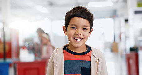 Image showing Young, student and classroom with happy portrait for education, kindergarten or kid learning in casual style. Boy, child and face at academy to study, develop and excited at school with scholarship