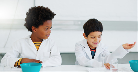 Image showing Science, students and boys in a classroom, conversation and chemistry with education, talking and learning. Friends, kids and children with discussion, teaching and knowledge with experiment and fun
