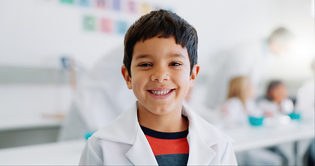 Image showing Happy, portrait and a child in science at school for learning, education or an experiment. Smile, classroom and a boy, kid or student in a lab for studying, innovation and research in physics