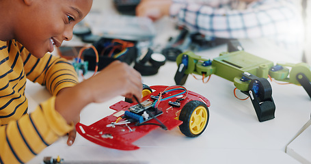 Image showing Robotics, boy and technology in classroom for education or learning electronics with car toys for innovation. School kids, learners and transportation knowledge in science class for research or study