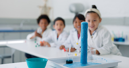 Image showing Science, experiment and chemical reaction with kids in a classroom at school for education or development. Learning, wow and glass with student children in class to study research or innovation