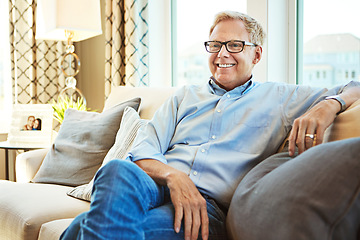 Image showing Thinking, mature or happy man on sofa to relax with calm on living room couch at home for resting. Ideas, glasses or senior male person with smile, peace or wellness in retirement, lounge or house
