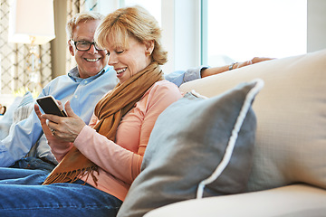 Image showing Phone, relax or mature couple on social media for communication, website or internet connection. Smile, senior man or happy woman with mobile app to scroll online on couch or sofa at home or house