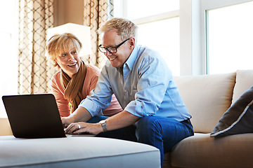 Image showing Laptop, mature or happy couple planning savings, property investment or online shopping together. Ecommerce website, smile or senior people typing to search for investing news on pc on sofa at home