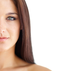 Image showing Portrait, beauty and mockup with a woman in studio isolated on a white background for natural skincare or cosmetics. Half face, skin and space with a young model looking confident in aesthetic care