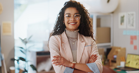 Image showing Portrait, business woman and fashion designer with arms crossed in clothes store or startup. Confidence, happy tailor and face of professional, entrepreneur and creative worker in glasses in Brazil