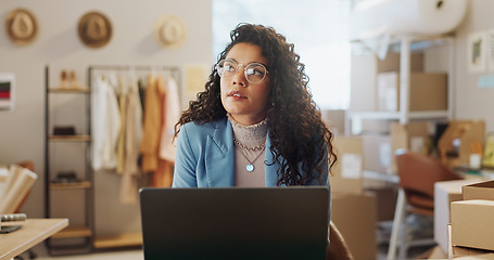 Image showing Entrepreneur, thinking and woman with a laptop, ecommerce and solution with startup, website and planning. Person, business owner and employee with a pc, brainstorming fashion and problem solving