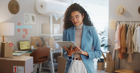 Image showing Woman, fashion designer and tablet in logistics, research or small business management at boutique. Female person or entrepreneur working on technology for inventory or storage check at retail store