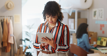 Image showing Happy woman, fashion designer and tablet in research, logistics or small business communication at boutique. Female person or employee smile on technology for online search or supply chain in retail