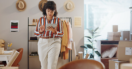 Image showing Woman, tablet and fashion of small business owner in logistics, research or communication at boutique. Female person or employee on technology for online search, supply chain or order at retail store