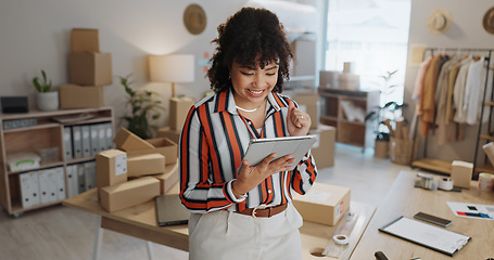 Image showing Tablet, small business and woman with success and package and order information. Home, entrepreneur and ecommerce of a female person with boxes for distribution and delivery of online shopping stock