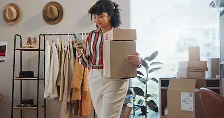 Image showing Happy woman, phone and boxes in logistics for communication, online order or delivery at boutique. Female person or employee on mobile smartphone for shipping, networking or small business at store