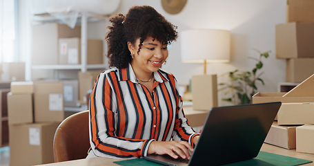 Image showing Boxes, smile and woman with a laptop, ecommerce and online reading with website information, professional and startup. Happy person, entrepreneur or business owner with a pc, email or search internet