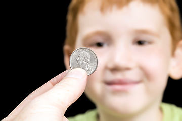 Image showing the coin is a quarter of an American dollar