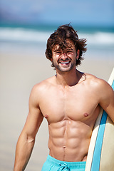 Image showing Beach portrait, surf and strong man on sports holiday adventure, travel vacation or nature freedom for fresh air. Surfing training, fitness or summer athlete ready for surfboard trip, journey or swim